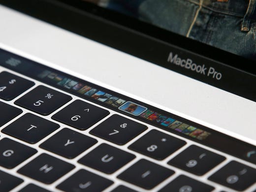 A Touch Bar on a MacBook Pro computer is displayed