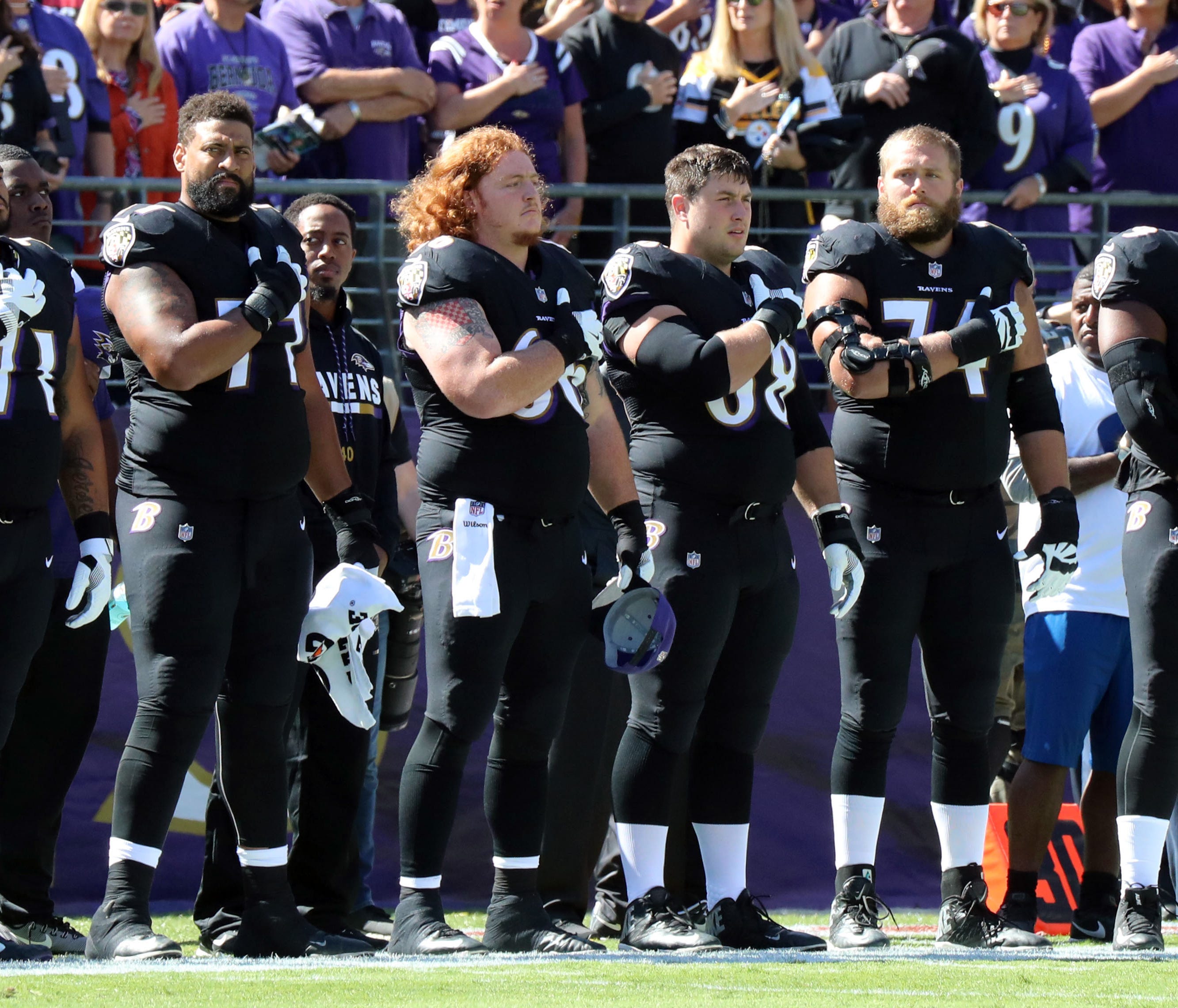 Oct 1, 2017; Baltimore, MD, USA; Baltimore Ravens players stand for the National Anthem prior to their game against the Pittsburgh Steelers at M&T Bank Stadium. Mandatory Credit: Mitch Stringer-USA TODAY Sports ORG XMIT: USATSI-358894 ORIG FILE I