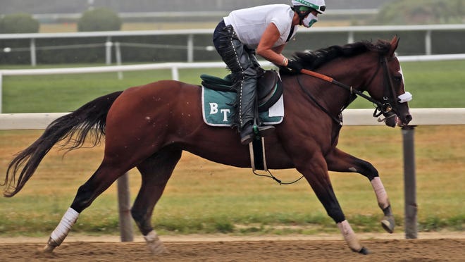Robin Smullen rides Tiz the Law during a workout at Belmont Park on Friday.