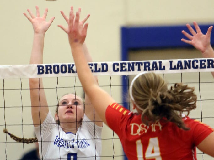DSHA's Katie Arnold (14) attempts to hit past Brookfield