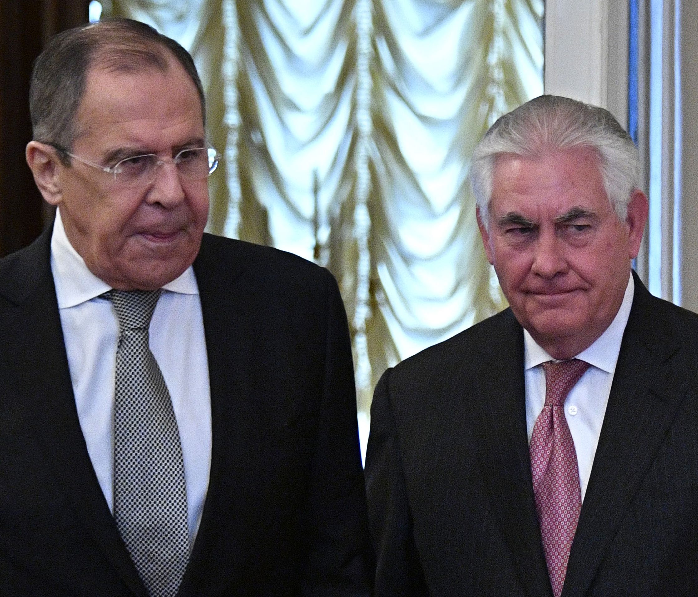 Russian Foreign Minister Sergei Lavrov and Secretary of State Rex Tillerson enter a hall during a meeting in Moscow on April 12, 2017.