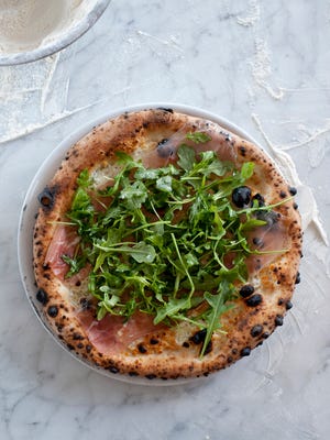 Fresh local produce and cured meats top the wonderfully balanced pizzas at Pizzicletta.