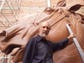 El Paso sculptor John Houser stands by the horse head