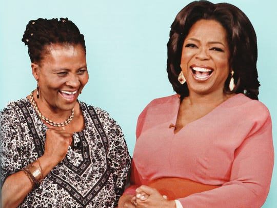Dr. Trent with Oprah Winfrey.