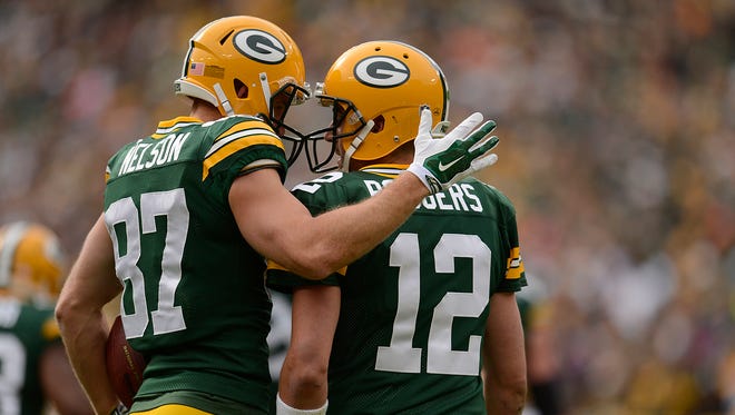 Green Bay Packers receiver Jordy Nelson and quarterback Aaron Rodgers celebrate their touchdown in the first quarter during Sunday's game against the Carolina Panthers at Lambeau Field. The two connected for a 59-yard touchdown. Evan Siegle/Press-Gazette Media