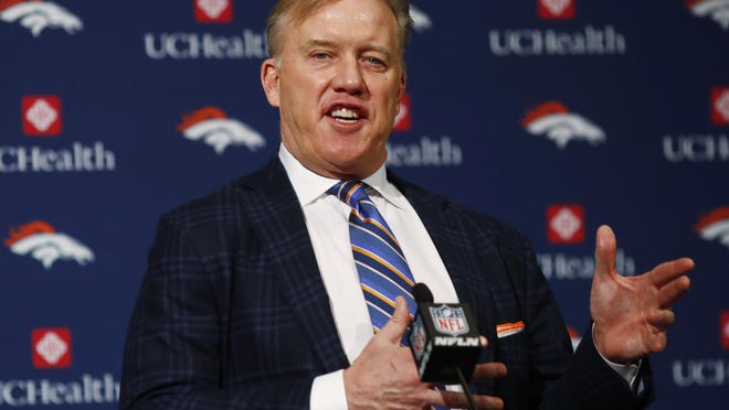 Denver Broncos general manager John Elway responds to questions after the introduction of Vance Joseph as the new head coach of the NFL football team during a news conference in January at the team's headquarters.