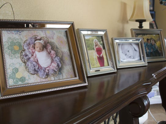 Family photos are displayed at Shannon Geise's home
