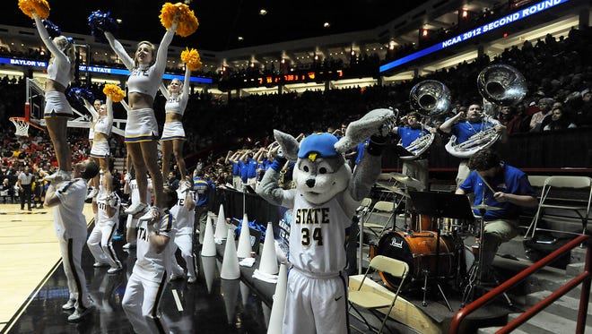 South Dakota State University cheerleaders and band motivate the crowd while they play Baylor during the 2012 NCAA Men's Basketball Tournament in 2012.