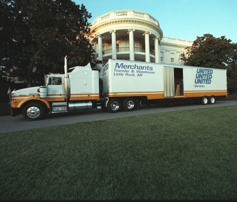 A moving van with the Clintons' belongings parks near the South Portico of the White House on the day of Bill Clinton's inauguration on Jan. 20, 1993.