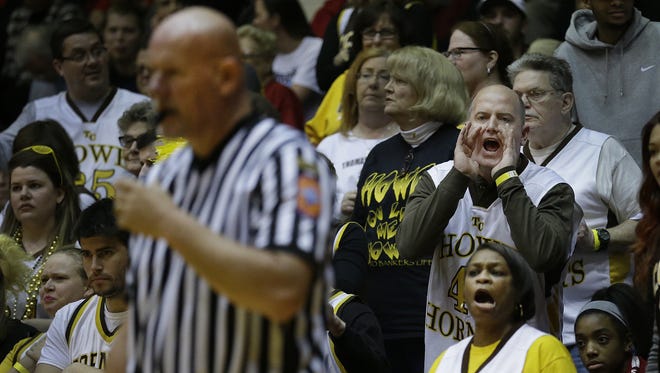 Fans from Howe give their opinions to the IHSAA officials in the second half of their Class 2A semistate game, March 19, 2016.