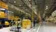 Boeing Dreamliner fuselages are worked on at the company's