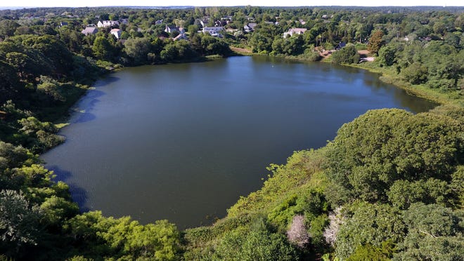 An aerial view of Uncle Harvey's Pond in Orleans, which is listed by the state as an impaired pond.
