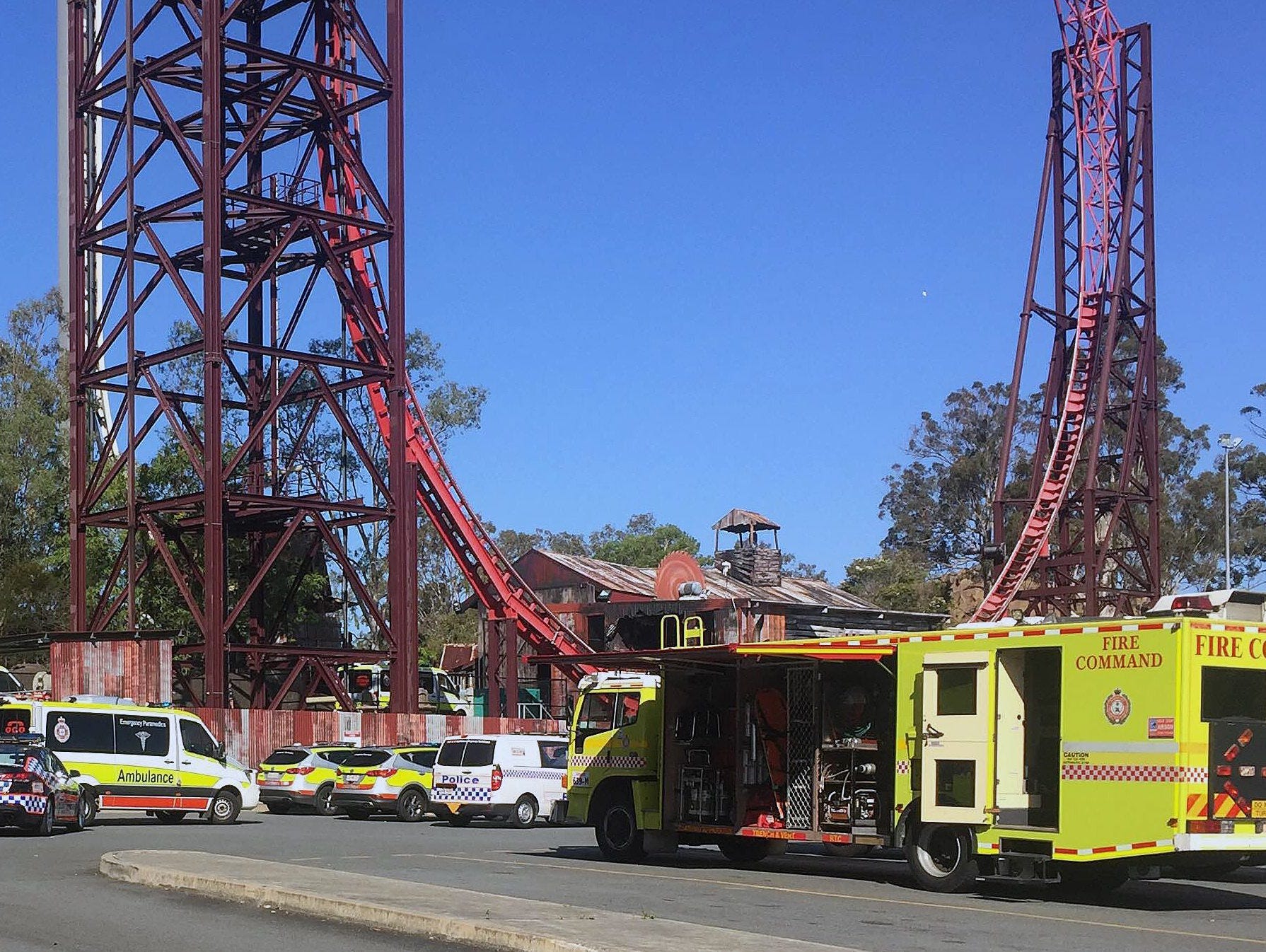Emergency services vehicles are seen outside the Dreamworld theme park at Coomera on the Gold Coast, Queensland, Australia, Oct. 25, 2016.