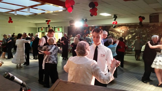 Richmond High School students dance with guests at the 2015 Platinum Prom.