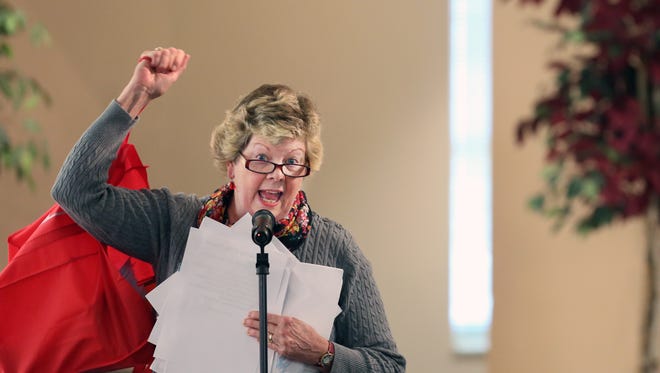 Irene Yeager holds up various assessments related to the new VA Hospital and called them worthless. Nov. 15, 2016