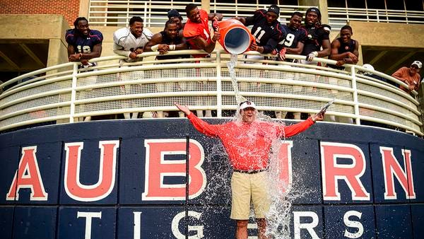 Auburn coach Gus Malzahn took part in the ALS Ice Bucket Challenge on Wednesday.