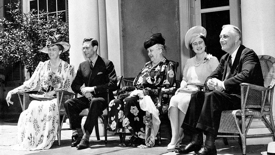 After attending Sunday services together, the first families of the United Kingdom of Great Britain and the United States of America pose on the veranda of the Roosevelt family estate in Hyde Park, N.Y., on June 11, 1939. From left are, first lady Eleanor Roosevelt; King George VI; Sarah Delano Roosevelt, the president's mother; Queen Elizabeth; and President Franklin D. Roosevelt.