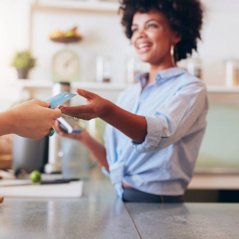 Customer paying for a purchase with a credit card.