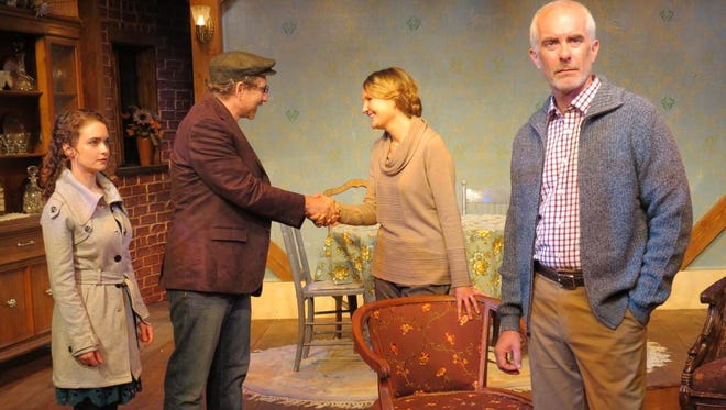 A meeting between daughter (Cathryn Wake), fiancee (Michael Louis Serafin-Wells) and mother (Gina Costigan) seems to displease stepfather Kevin Hogan in “The Seedbed,” the dark drama by Bryan Delaney.