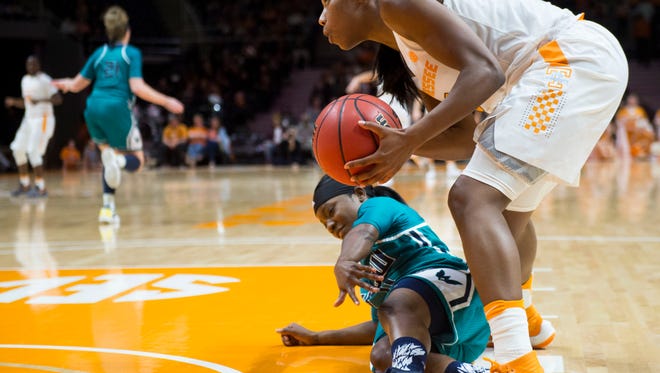 Tennessee's Jordan Reynolds steals the ball from UNC Wilmington’s Jasmine Steeleon at Thompson-Boling Arena on Thursday, Dec. 29, 2016.