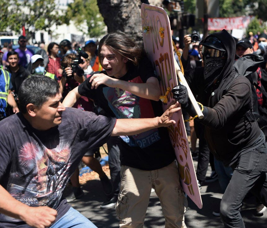 Demonstrators clash during the 