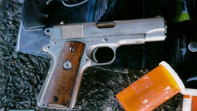 This .45-caliber Colt Combat Commander was kept in a safe that could be accessed with a combination and key, according to a stipulation at Paul Henry III's double-murder trial. The safe was inside his mother's home. They both lived in separate homes on a more than 10-acre farm in East Manchester Township. Prosecutors said at trial that this handgun was the murder weapon.