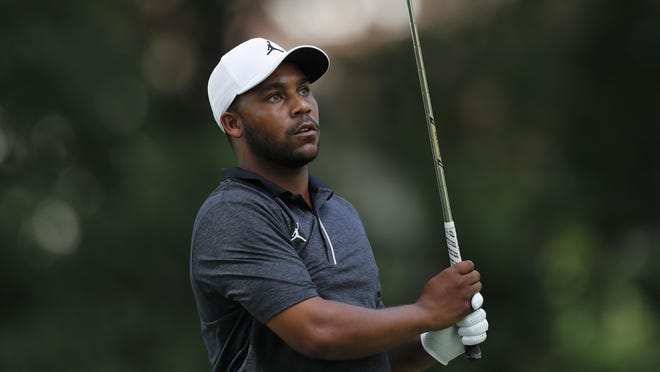Harold Varner III watches his drive on the 11th tee during the first round of the Rocket Mortgage Classic golf tournament, Thursday, July 2, 2020, at the Detroit Golf Club in Detroit.