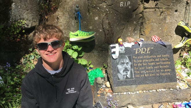 Robert E. Lee sophomore Oliver Wilson-Cook poses next to "Pre's Rock," one of the many memorials to Steve Prefontaine, the University of Oregon's legendary track star, in Eugene, Ore., during Wilson-Cook's trip with his mother, Nicole, to compete in the Eugene Half Marathon the weekend of May 5-7, 2017.  The site is where Prefontaine, one of the runners who helped spark the running boom in the U.S. in the early 1970s, died in a car crash on May 30, 1975.