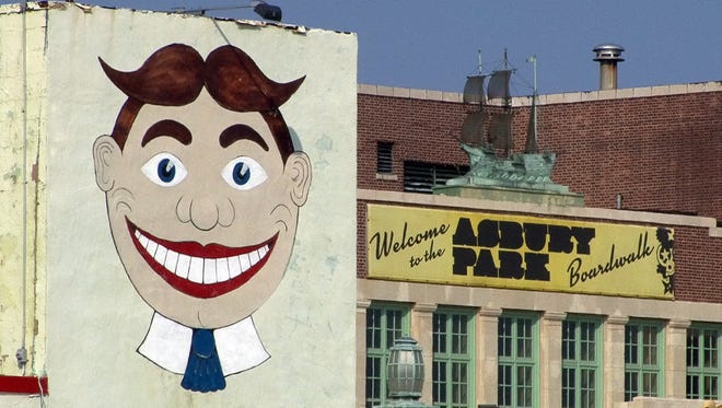 2013 The "Tillie" head over the Wonder Bar is shown in the foreground with the Paramount Theater on the Asbury Park boardwalk at right.