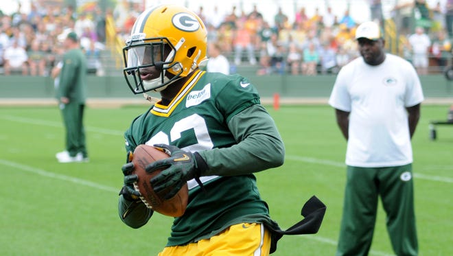 Green Bay Packers safety Chris Banjo catches the ball during drills at training camp practice at Ray Nitschke Field, Thursday, August 21, 2014.