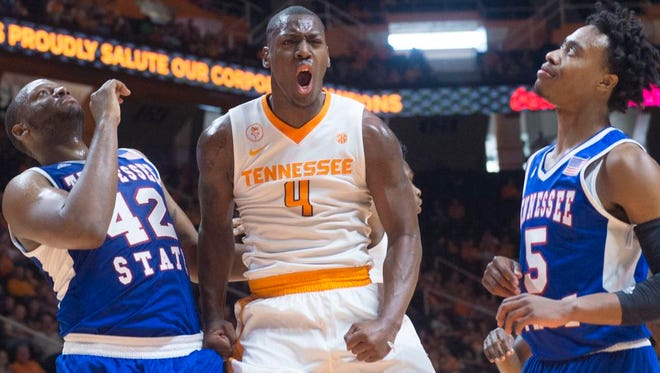 Tennessee's Armani Moore (4) celebrates after scoring against Tennessee State in the first half in Knoxville on Tuesday.