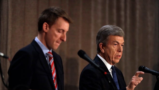 Republican incumbent Sen. Roy Blunt, right, speaks alongside Democratic challenger Jason Kander during the first general election debate in Missouri's race for U.S. Senate at the Missouri Press Association convention Friday, Sept. 30, 2016, in Branson, Mo.