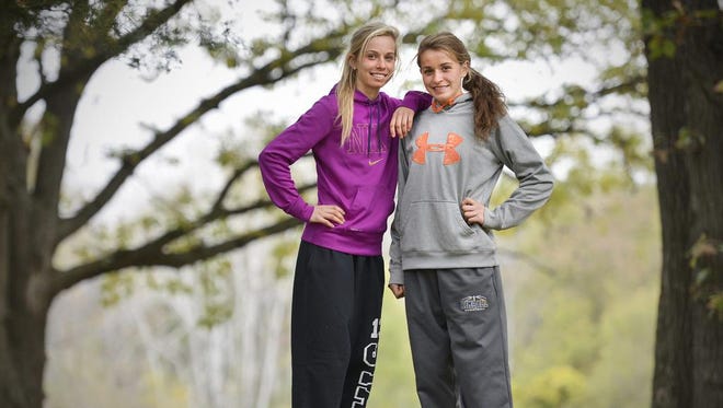 Eden Valley/Watkins-Kimball cross country team members and sisters, senior Emily (left), and sophomore Anna Donnay are both state ranked. They were photographed Tuesday, Sept. 30 in Kimball.