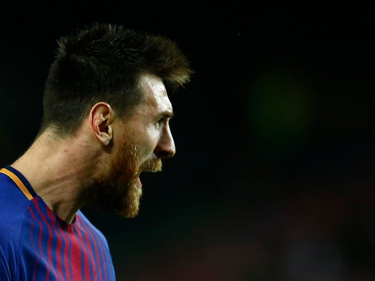 Barcelona's Lionel Messi reacts after scoring during the group D Champions League soccer match between FC Barcelona and Olympiakos at the Camp Nou stadium in Barcelona, Spain, Wednesday, Oct. 18, 2017. (AP Photo/Manu Fernandez)