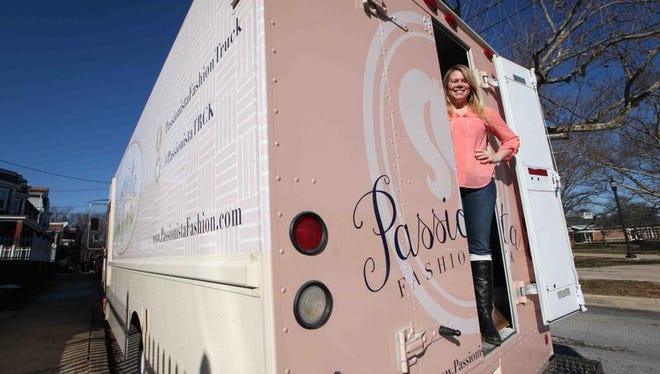 Emily Durán appears with her Passionista fashion truck, where she sells apparel and accessories.