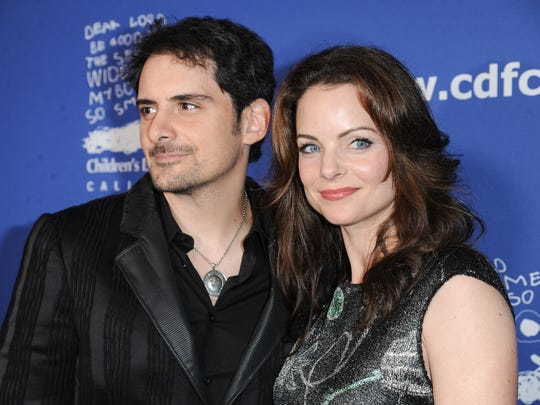 Brad Paisley, on the left, and Kimberly Williams-Paisley arrive