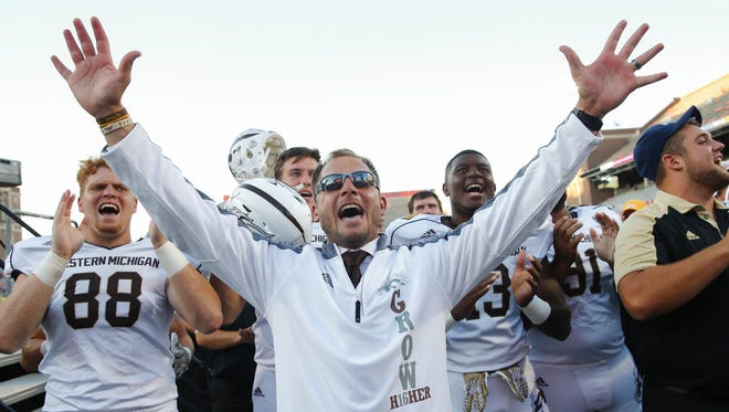 Head coach P.J. Fleck of the Western Michigan Broncos celebrates after the game against the Illinois Fighting Illini at Memorial Stadium on Sept. 17, 2016, in Champaign, Ill. Western Michigan defeated Illinois 34-10.