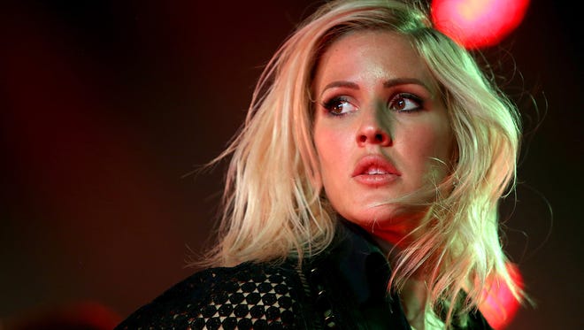 Ellie Goulding performs at the St Pancras Renaissance Hotel on June 30 in London. The British singer will release her third album, 'Delirium,' on Friday.