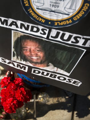 A memorial on the corner of Rice Street and Valencia in Mt. Auburn for Sam DuBose continues to grow since the police cleared it so the jury could view the site at the beginning of the Ray Tensing murder trial.