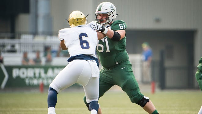 Portland State's Justin Outslay (61) has started all three games at right tackle for the Vikings in his senior season.