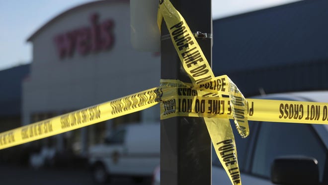 Pennsylvania State Police are investigating the murder of three people and suicide of the shooter 24-year-old Randy Robert Stair, of Dallas, Pa., at the Weis Supermarket on the Hunter Highway in Eaton Township, Pa., on Thursday, June 8, 2017. (Jake Danna Stevens/ The Times-Tribune, Via AP)