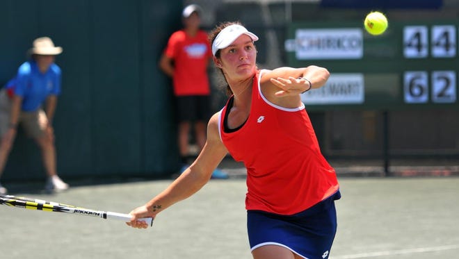 Katerina Stewart of Miami returns a shot during her match with Louisa Chirico of New Jersey at the Revolution Technologies Pro Tennis Classic singles championship at the Kiwi Tennis Club in Indian Harbour Beach Sunday afternoon. Stewart went on the win the match.