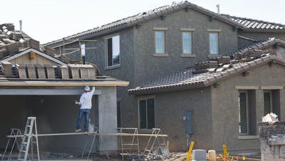 One of relatively few new homes being built this year in the Valley, this one in the Eastmark development in east Mesa
