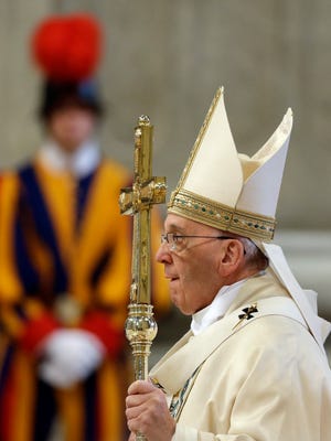 Pope Francis arrives to celebrate an Armenian-rite Mass on April 12, 2015, in St. Peter's Basilica at the Vatican.