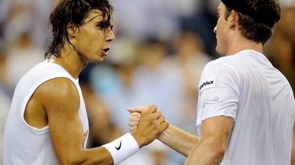 Ryler DeHeart, right, shakes hands with Rafael Nadal following their second-round match in the 2008 U.S. Open.