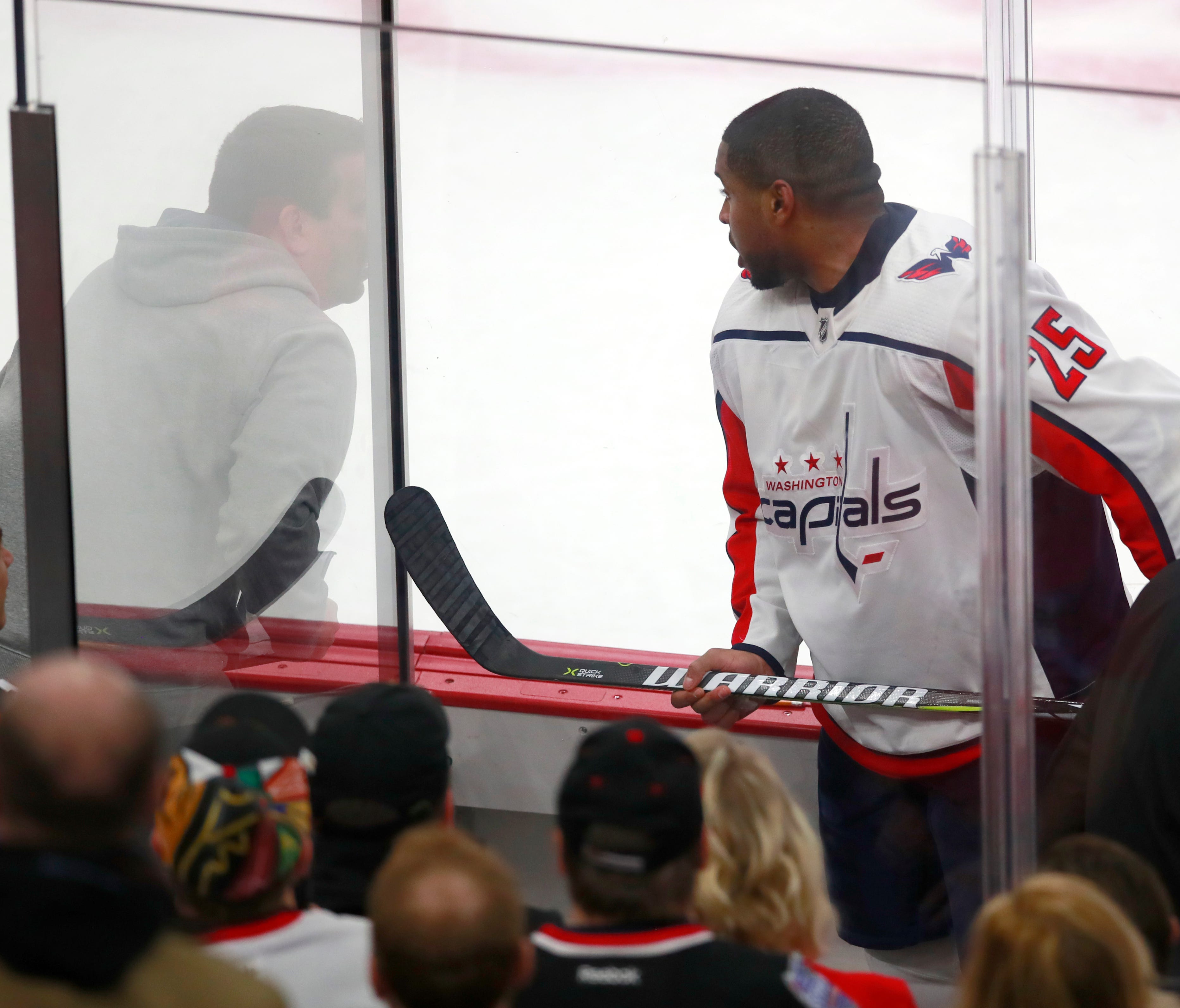 Washington Capitals right wing Devante Smith-Pelly (25) confronts Chicago Blackhawks fans from the penalty box during the third period Saturday.