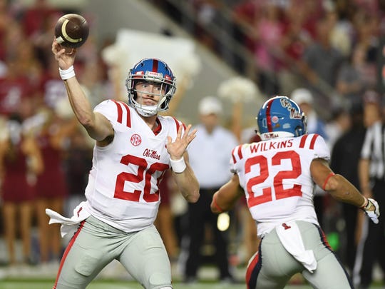 Shea Patterson passes against Alabama in 2017.