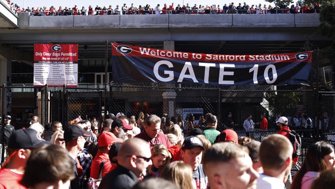 Georgia fans wait for the start of the Dawg walk before an NCAA college football game between Georgia and Massachusetts in Athens Ga., Saturday, Nov. 17, 2018.