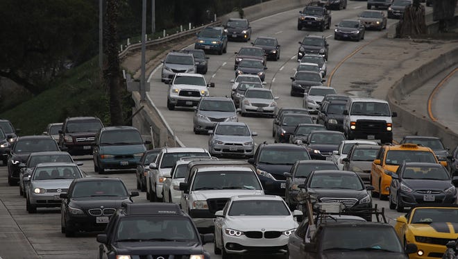 Cars travel along U.S. Highway 101 inLos Angeles, California. A U.S. News & World Report ranking placed California last in quality of life.