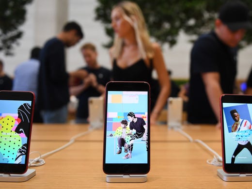 Some Apple iPhones at its headquarters in London, Aug